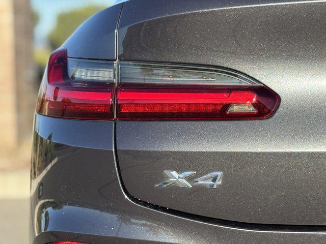 used 2021 BMW X4 car, priced at $30,900