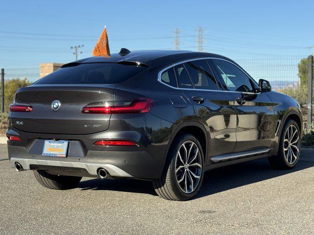 used 2021 BMW X4 car, priced at $30,900