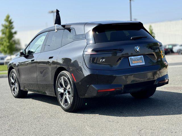 used 2024 BMW iX car, priced at $53,600