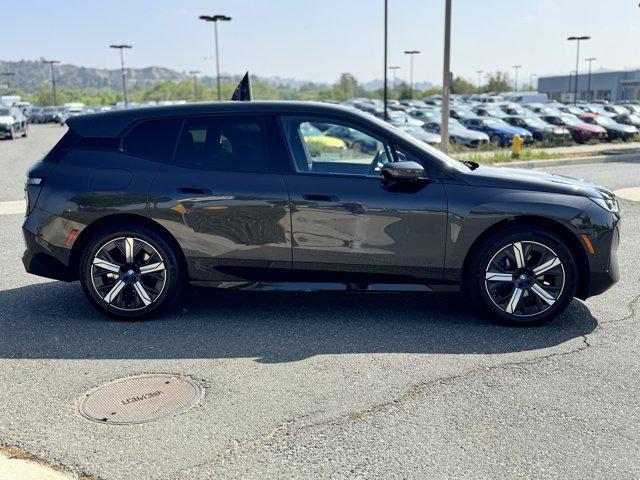 used 2024 BMW iX car, priced at $53,600