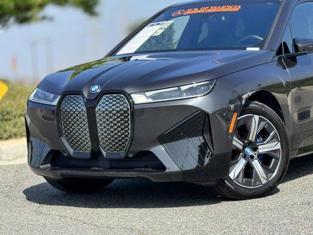 used 2024 BMW iX car, priced at $53,600