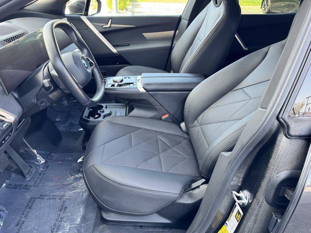 used 2024 BMW iX car, priced at $53,600