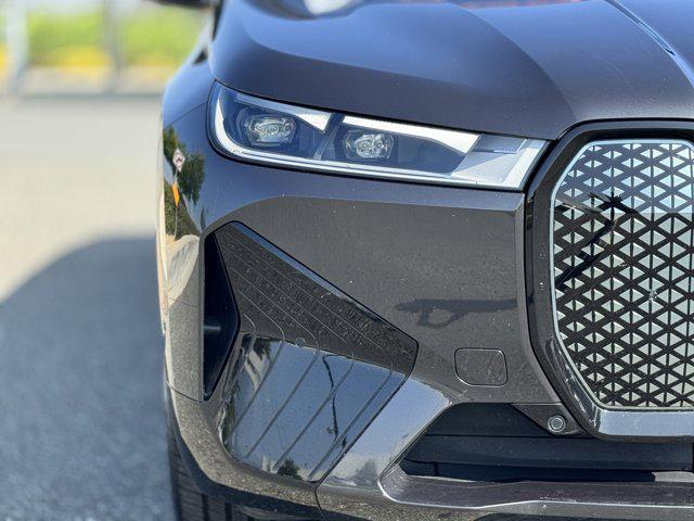 used 2024 BMW iX car, priced at $53,600