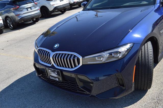 used 2023 BMW 330e car, priced at $38,130