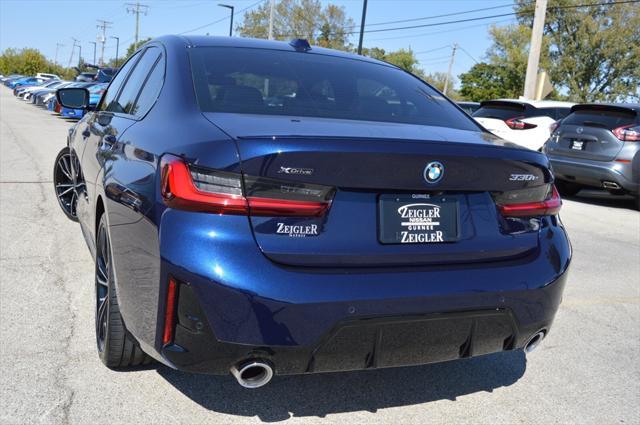 used 2023 BMW 330e car, priced at $38,130