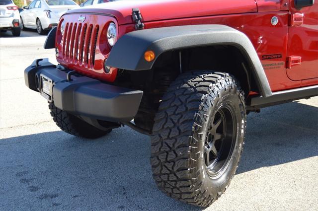 used 2014 Jeep Wrangler Unlimited car, priced at $20,771