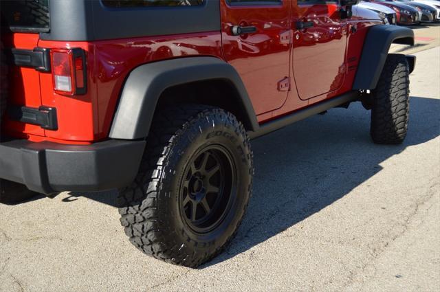 used 2014 Jeep Wrangler Unlimited car, priced at $20,771