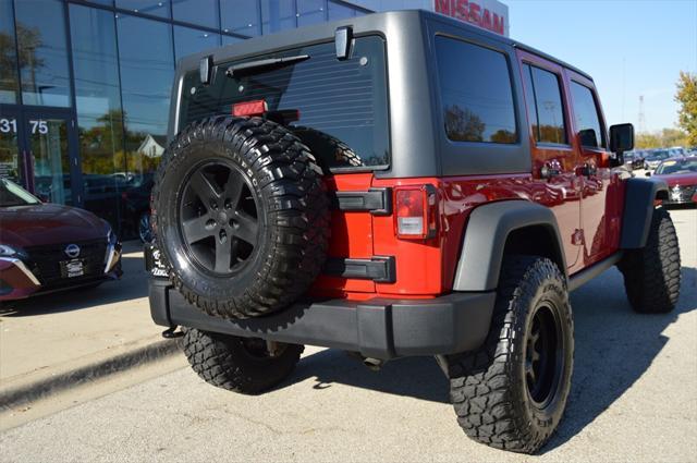 used 2014 Jeep Wrangler Unlimited car, priced at $20,771