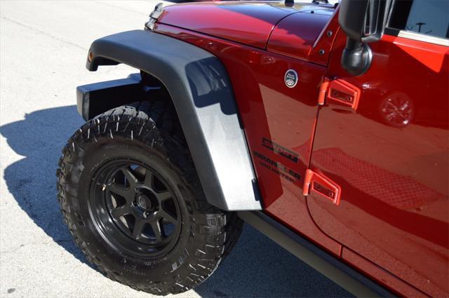 used 2014 Jeep Wrangler Unlimited car, priced at $20,771