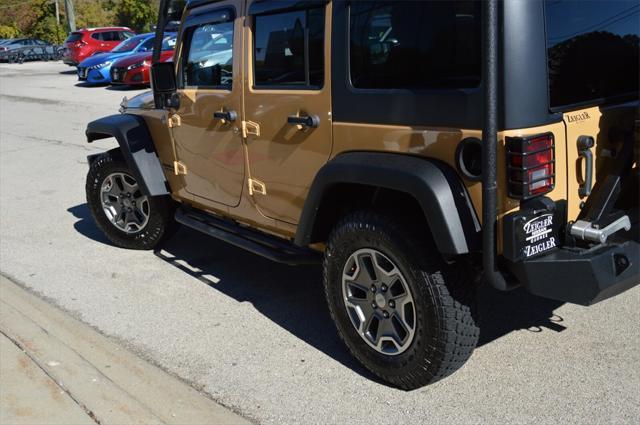 used 2014 Jeep Wrangler Unlimited car, priced at $24,441