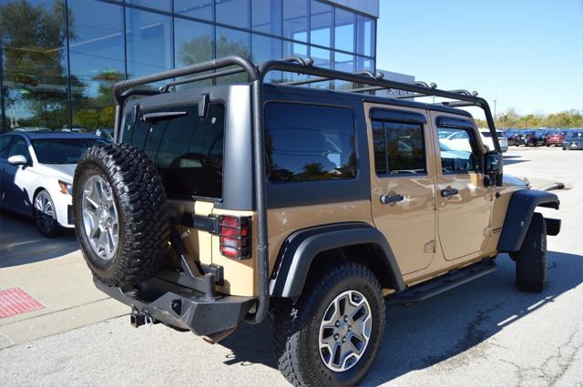 used 2014 Jeep Wrangler Unlimited car, priced at $24,441