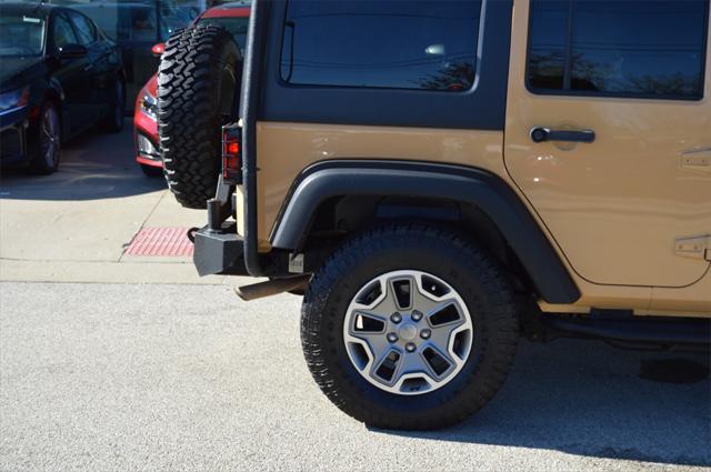 used 2014 Jeep Wrangler Unlimited car, priced at $24,441