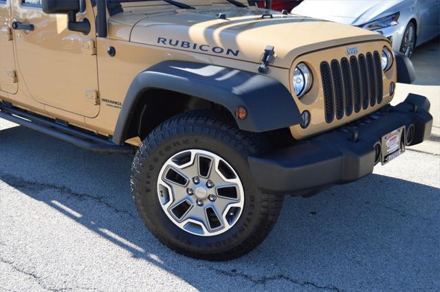 used 2014 Jeep Wrangler Unlimited car, priced at $24,441