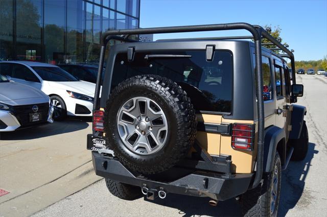 used 2014 Jeep Wrangler Unlimited car, priced at $24,441