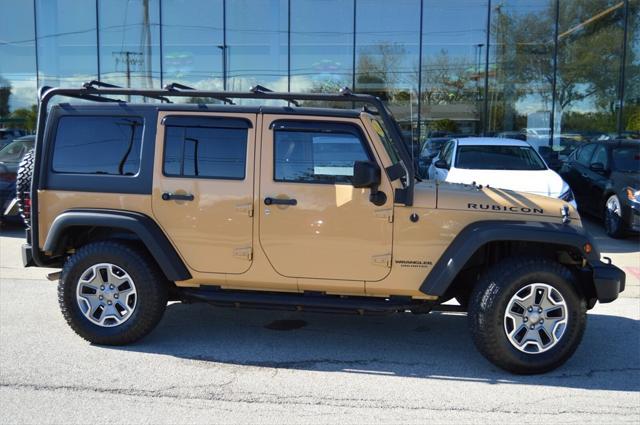 used 2014 Jeep Wrangler Unlimited car, priced at $24,441