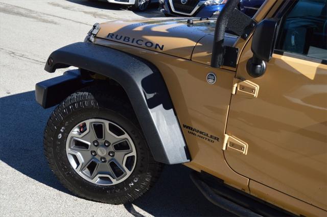 used 2014 Jeep Wrangler Unlimited car, priced at $24,441