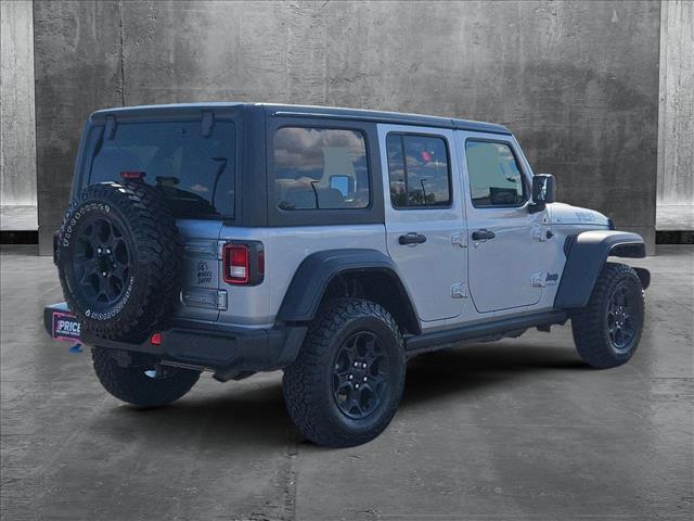 used 2023 Jeep Wrangler 4xe car, priced at $28,983