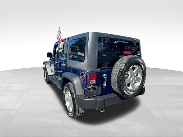 used 2013 Jeep Wrangler Unlimited car, priced at $21,998