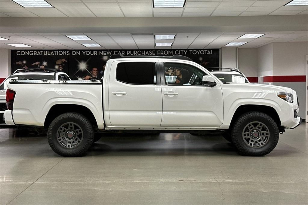 used 2021 Toyota Tacoma car, priced at $27,988