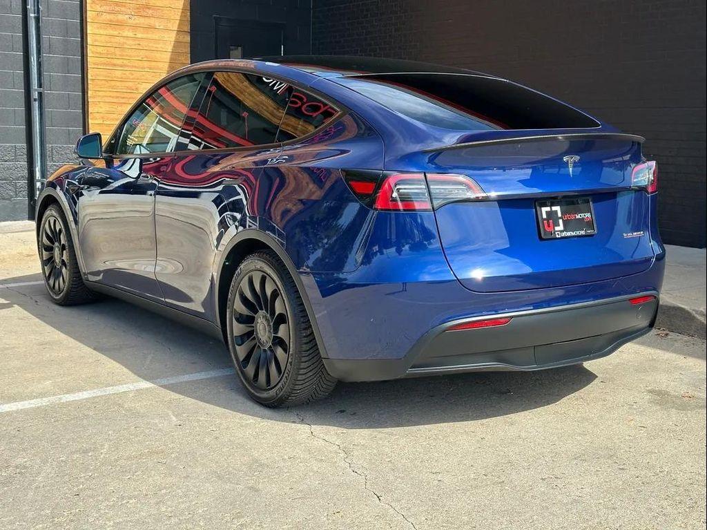 used 2023 Tesla Model Y car, priced at $28,490