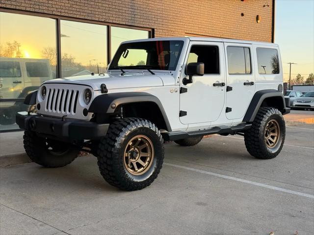 used 2015 Jeep Wrangler Unlimited car, priced at $19,990