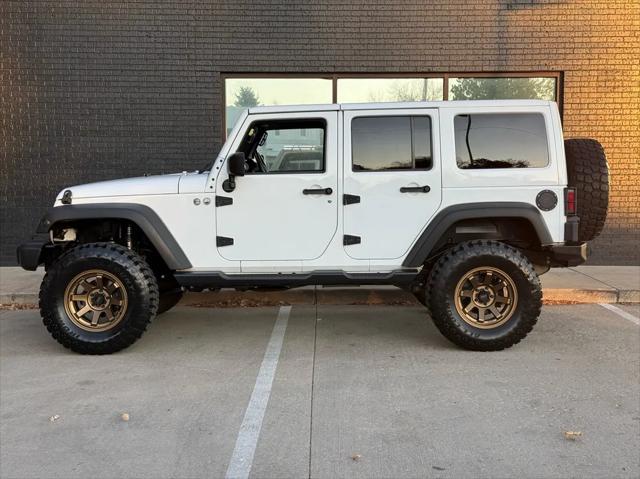 used 2015 Jeep Wrangler Unlimited car, priced at $19,990