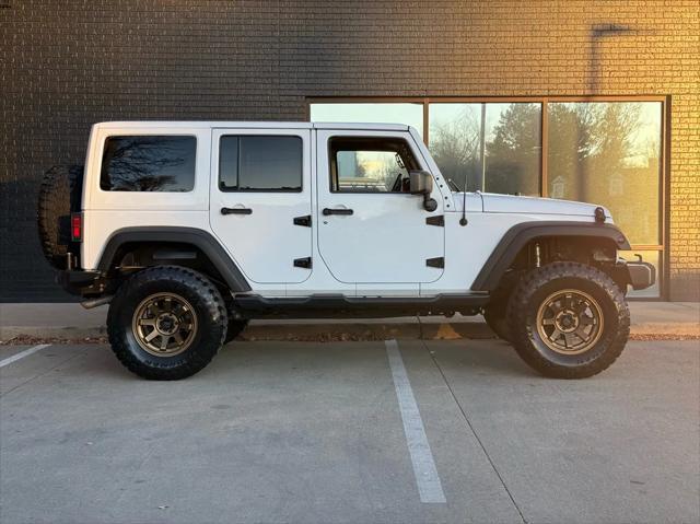 used 2015 Jeep Wrangler Unlimited car, priced at $19,990