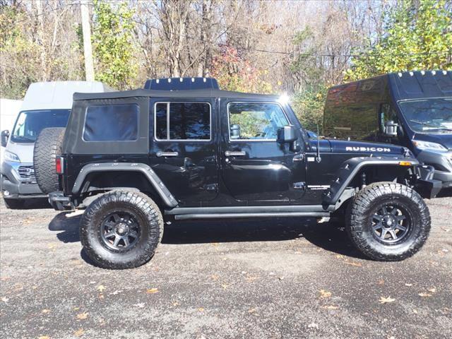 used 2018 Jeep Wrangler JK Unlimited car, priced at $23,500