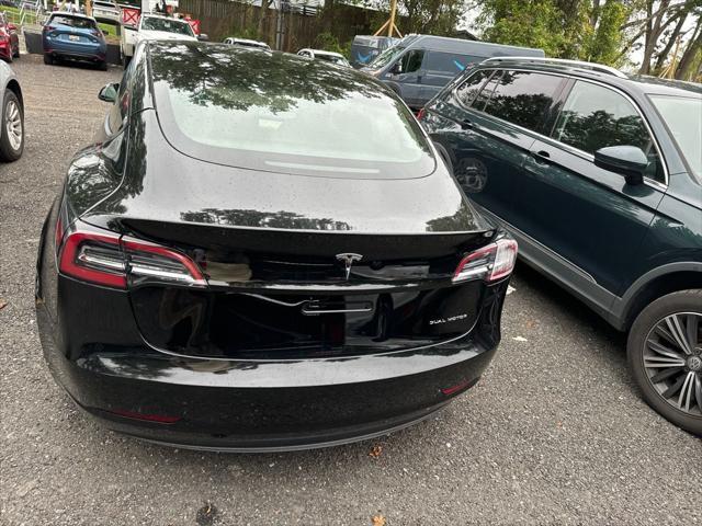 used 2022 Tesla Model 3 car, priced at $24,000