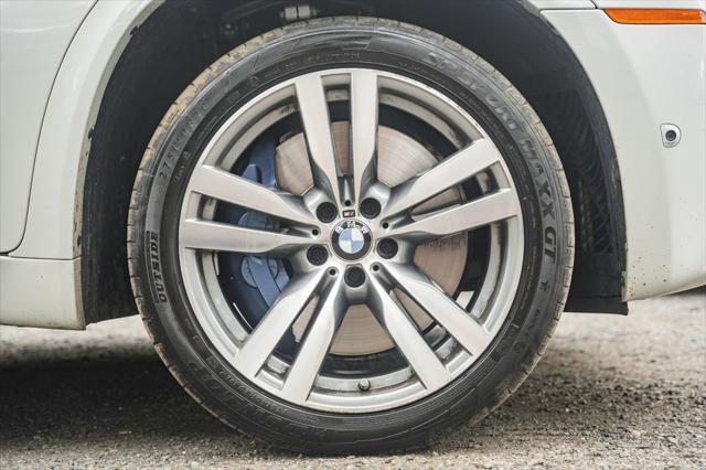 used 2013 BMW X5 M car, priced at $20,000