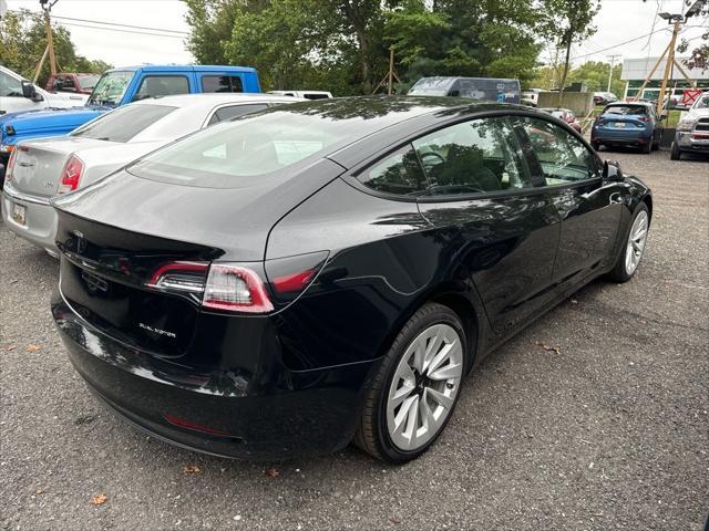 used 2022 Tesla Model 3 car, priced at $19,800