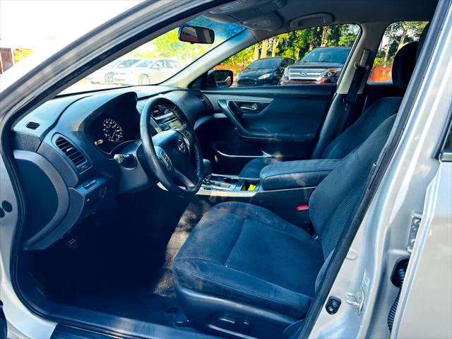 used 2014 Nissan Altima car, priced at $9,999