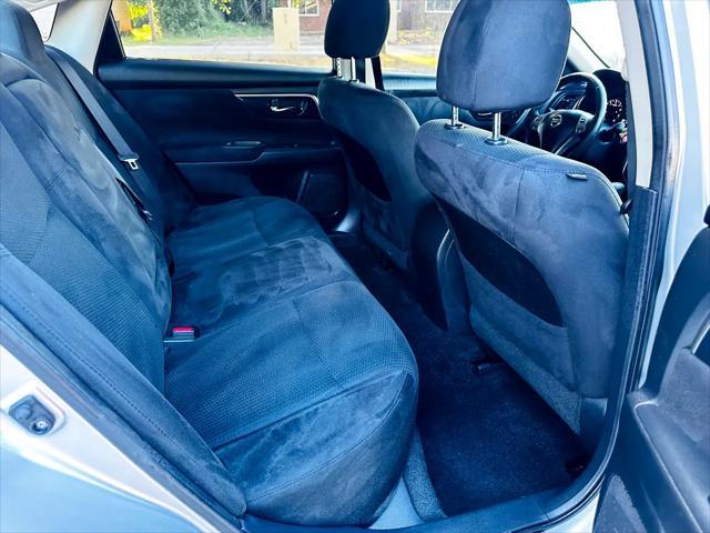 used 2014 Nissan Altima car, priced at $9,999