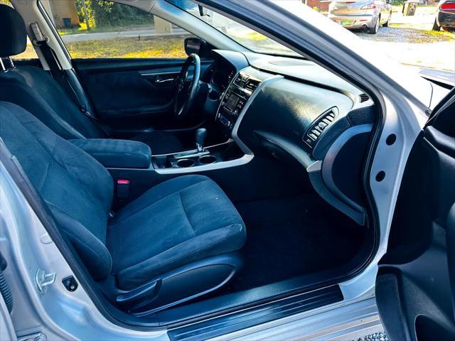 used 2014 Nissan Altima car, priced at $9,999