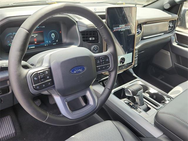 new 2025 Ford F-150 Lightning car, priced at $77,465