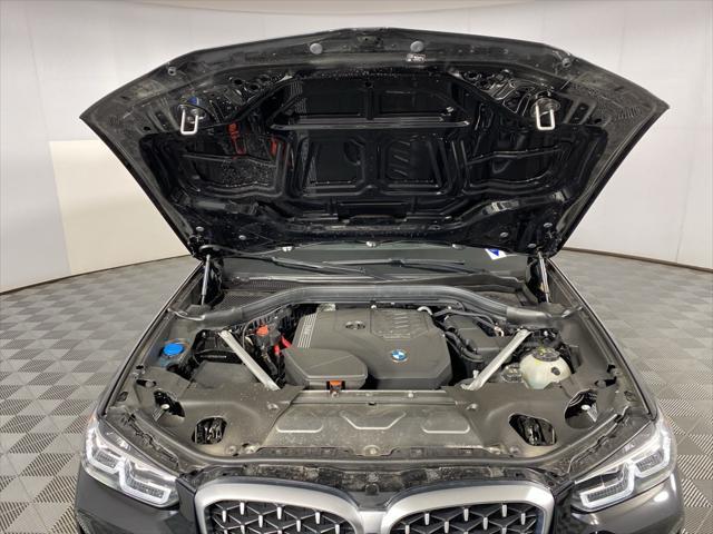used 2025 BMW X4 car, priced at $57,905