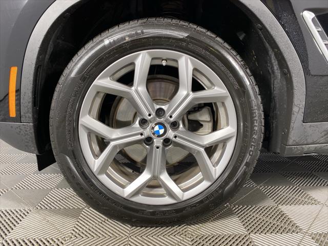 used 2025 BMW X4 car, priced at $57,905