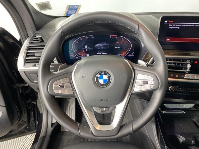 used 2025 BMW X4 car, priced at $57,905