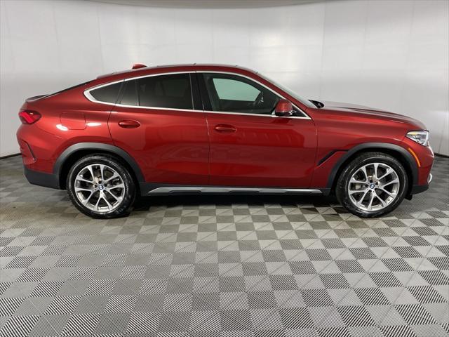 used 2022 BMW X6 car, priced at $60,522