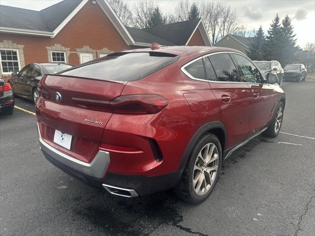 used 2022 BMW X6 car, priced at $60,522