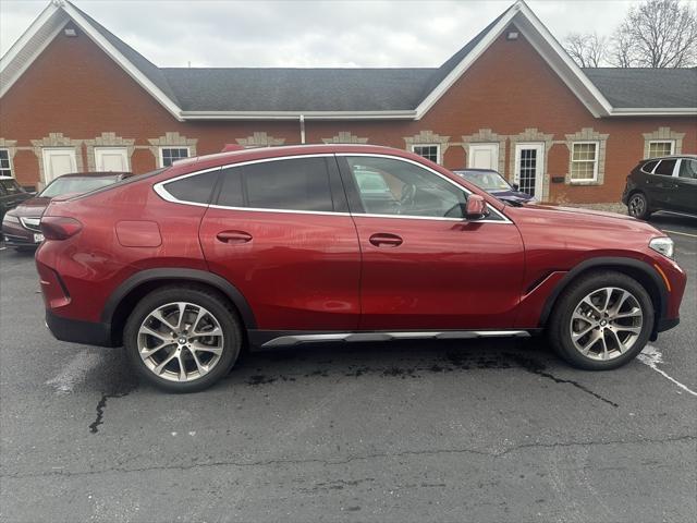 used 2022 BMW X6 car, priced at $60,522