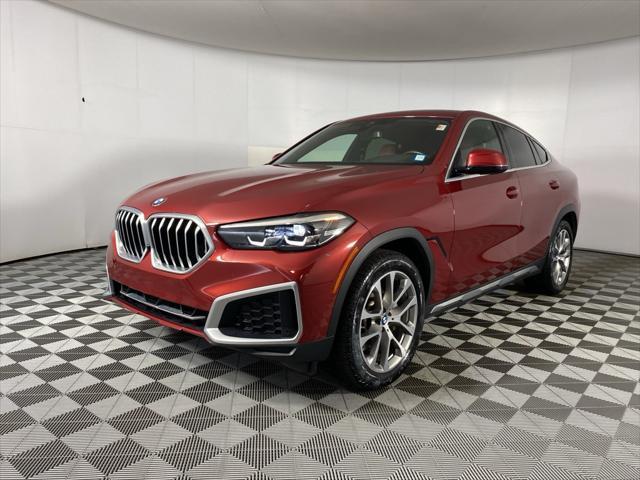 used 2022 BMW X6 car, priced at $60,522