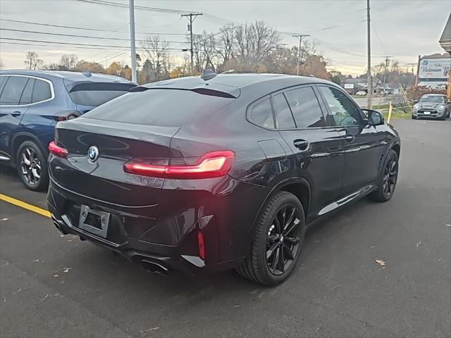 used 2022 BMW X4 car, priced at $55,911