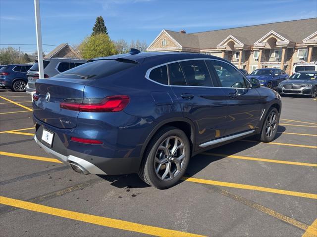 used 2023 BMW X4 car, priced at $48,911