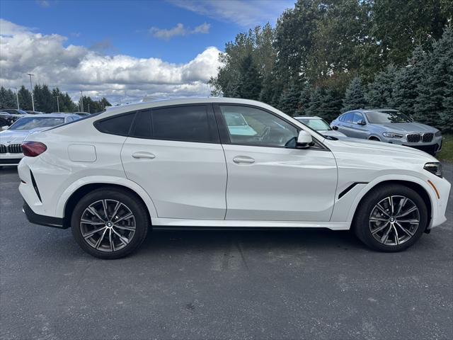 used 2023 BMW X6 car, priced at $66,909