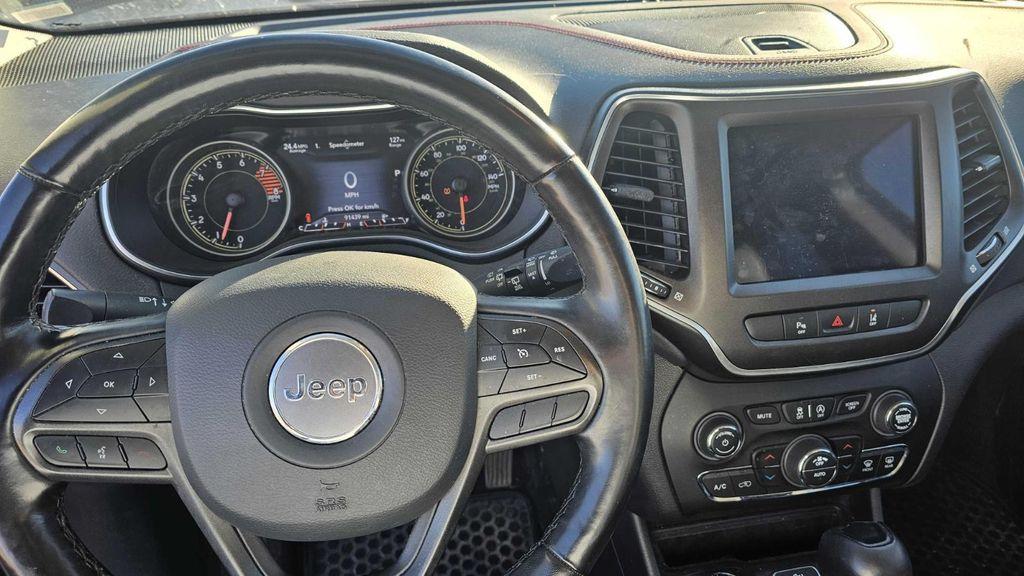 used 2021 Jeep Cherokee car, priced at $21,561