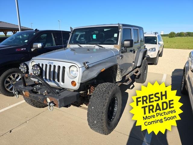 used 2010 Jeep Wrangler Unlimited car, priced at $15,946