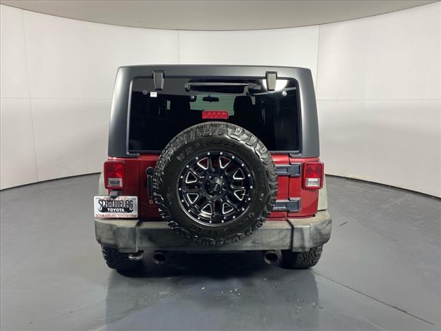 used 2011 Jeep Wrangler Unlimited car, priced at $12,355