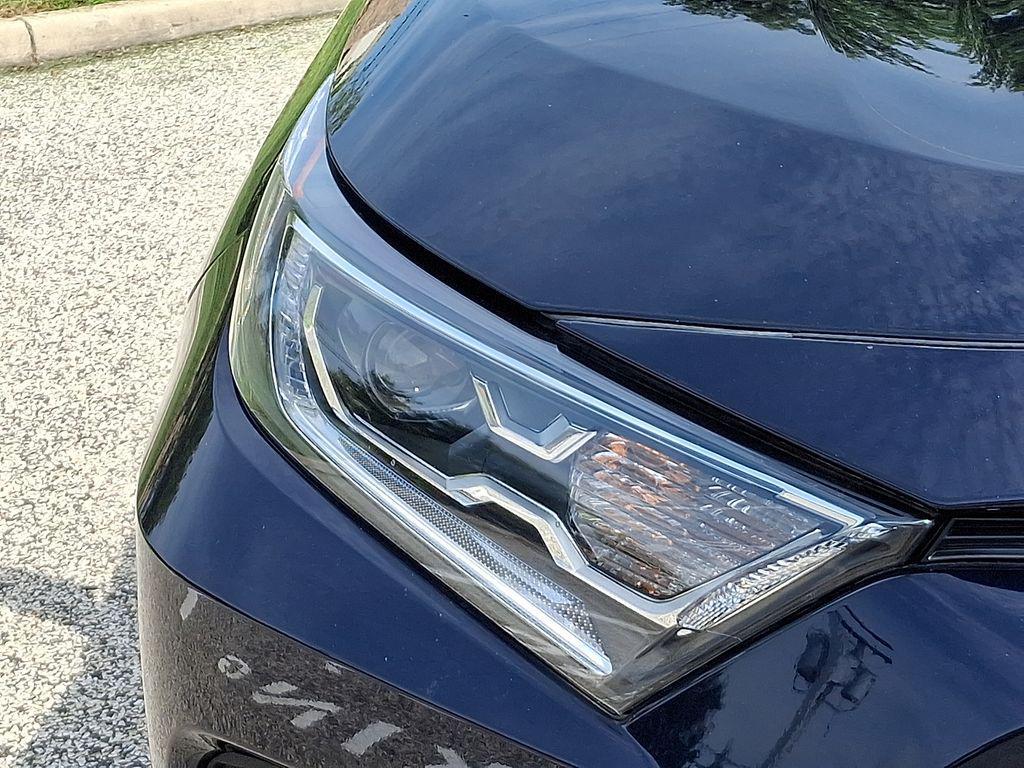 used 2021 Toyota RAV4 Hybrid car, priced at $30,143