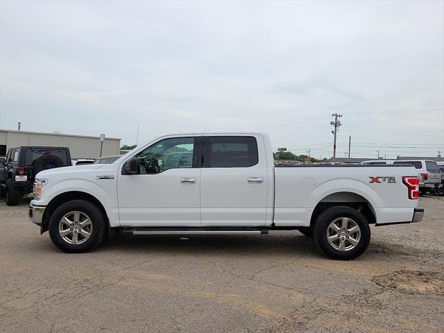 used 2018 Ford F-150 car, priced at $23,638